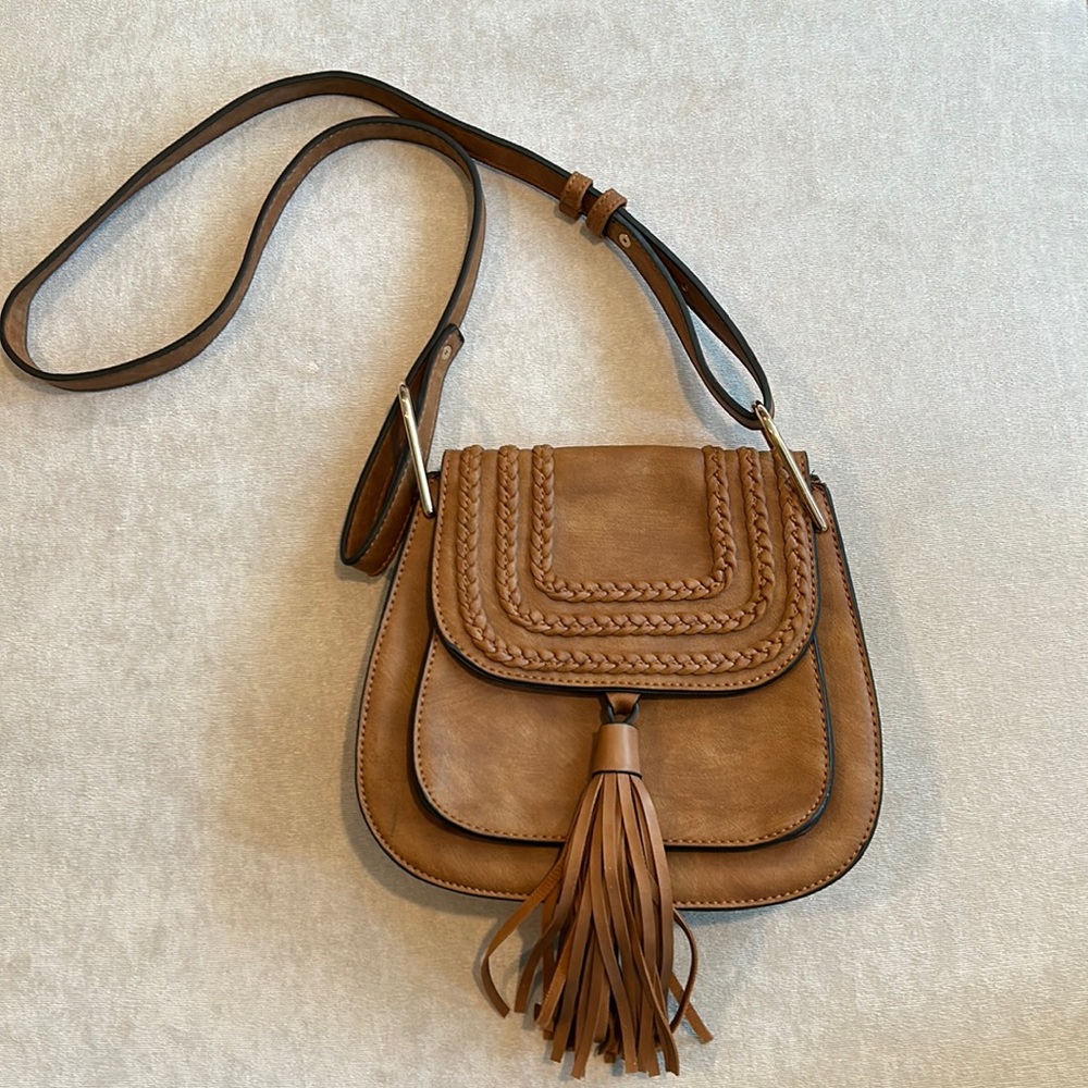 Tan over the shoulder bag with tassel